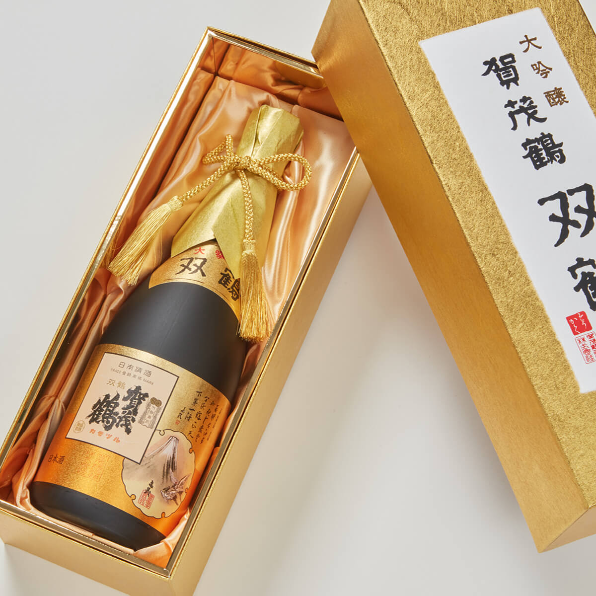 Kamotsuru “Sokaku” Daiginjo, lying inside a product box