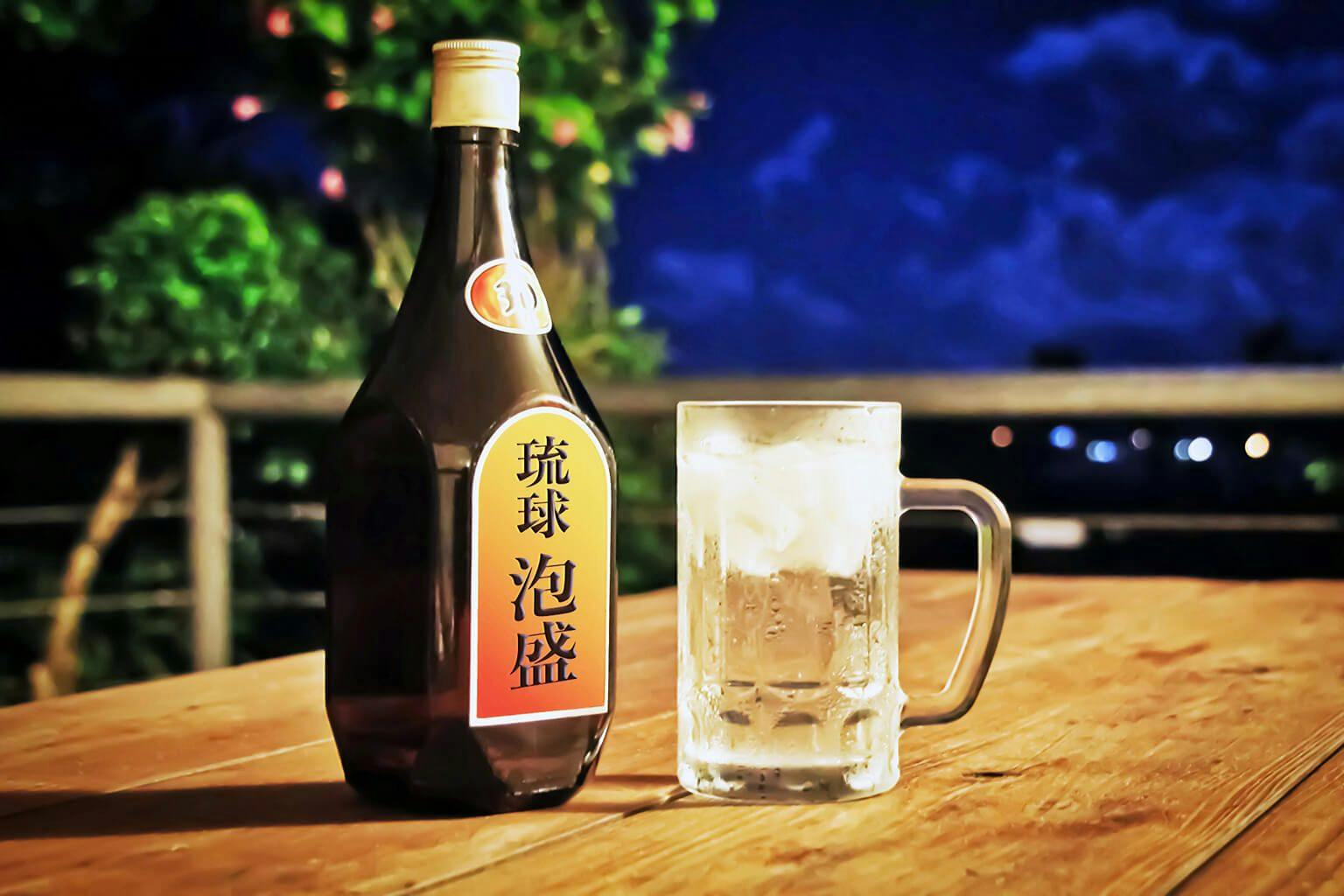 Awamori bottle with a glass