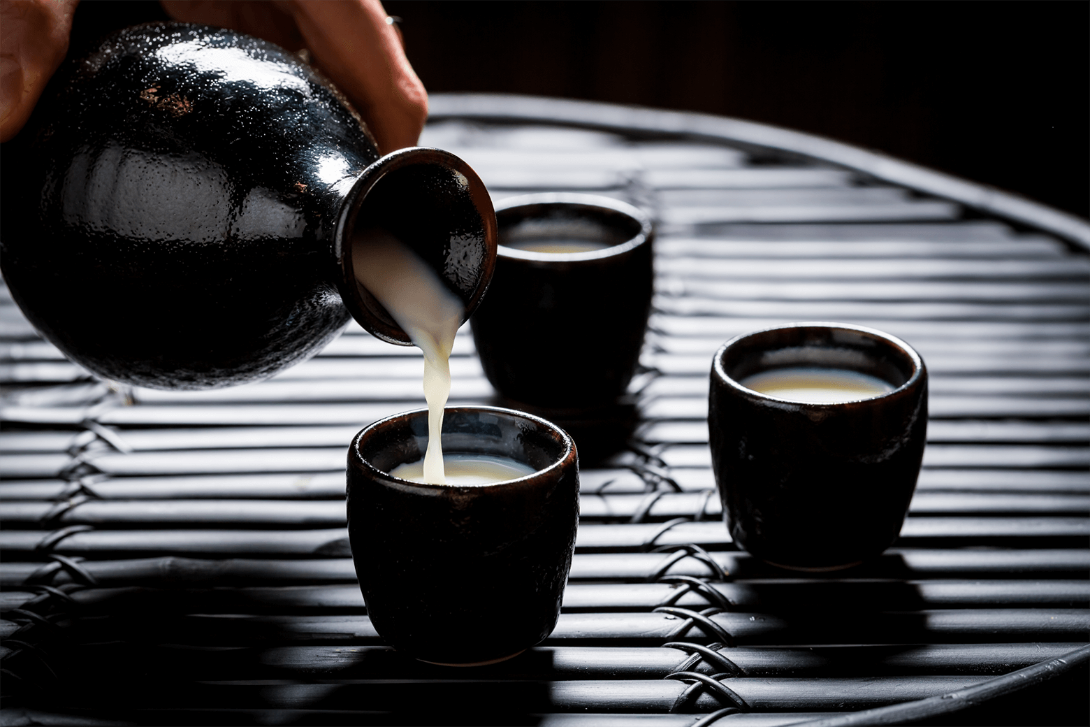 Pouring Nigori Sake