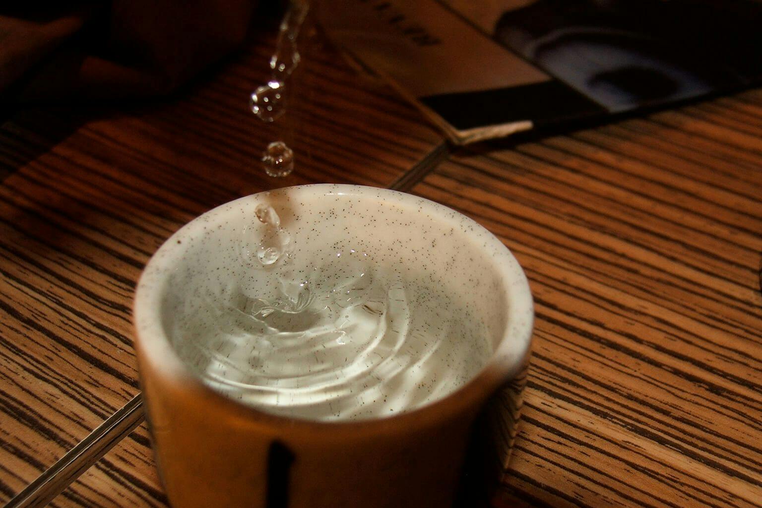 A moment of sake is poured