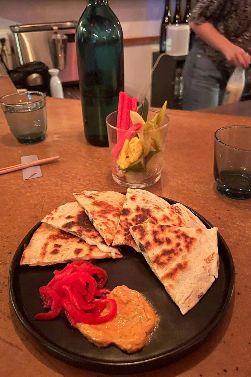 The huitlacoche quesadilla is made with mozzarella cheese and nori, served with pickled red onions and spicy mayo. | Photo by Taylor Markarian.