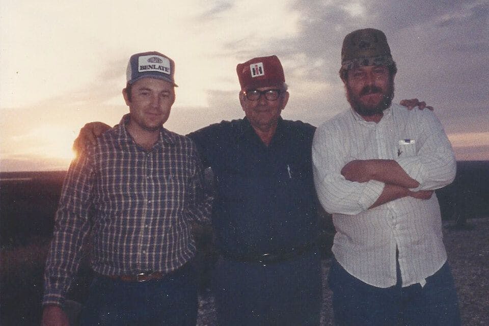 A young Chris Isbell with father Leroy Isbell and brother Benny on the family farm