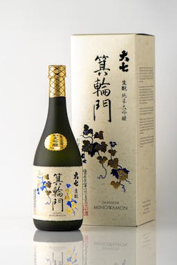 Daishichi “Minowamon,” standing in front of a product box