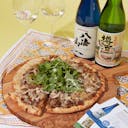 Hakkaisan “Tokubetsu Junmai” and Choryo “Yoshinosugi no Taru Sake” Futsushu with chardonnay glasses, served with gourmet pizza