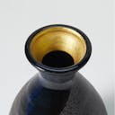 “Mino no Takumi” Black Tokkuri With Blue Drip Glaze and Gold Interior, upward angled close view