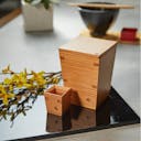 “Omoeraku” Nikko Cedar Sakazuki Cup, on a table